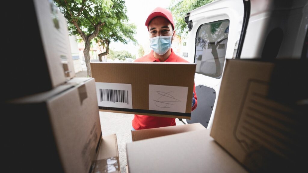 Delivery guy unloading deliveries