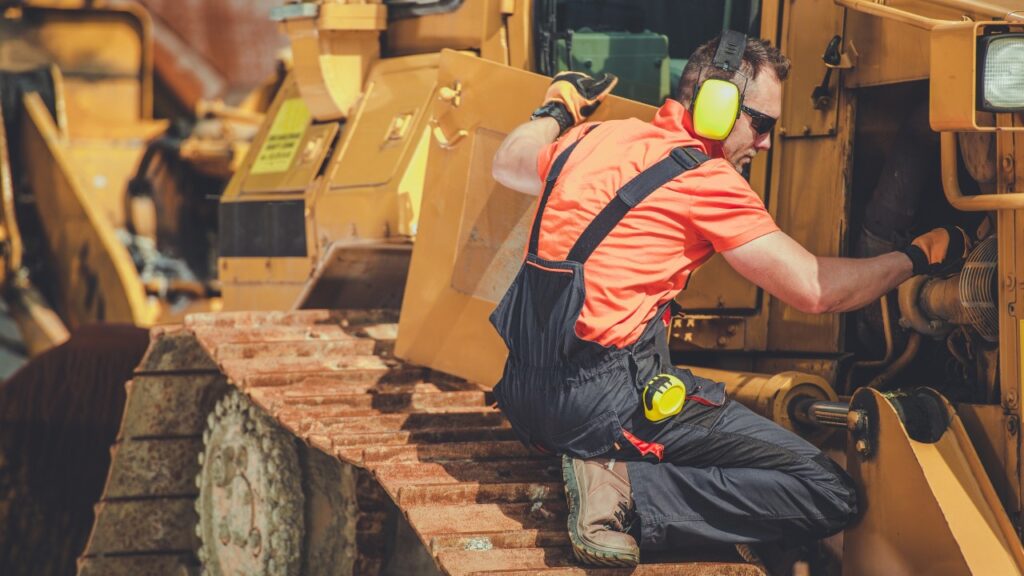 Diesel mechanic working on a Dozer