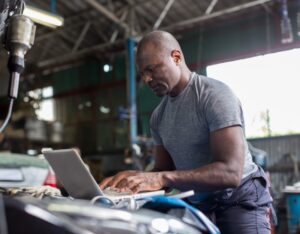 Technician using onboard diagnostics